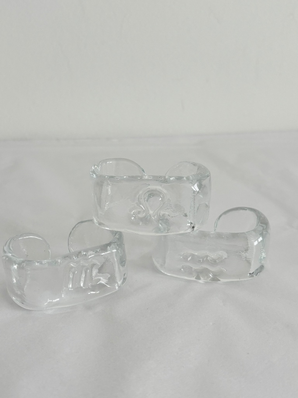Vintage glass napkin rings SET of THREE MCM style embedded design on each one
